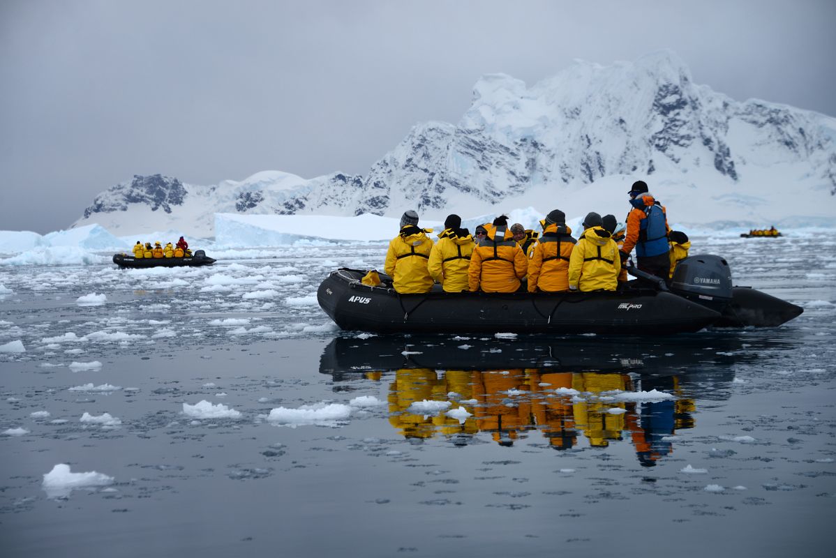 10B Zodiacs In Paradise Harbour With Mountain On Lemaire Island Beyond On Quark Expeditions Antarctica Cruise